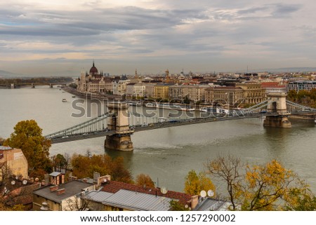 Panorama of the Hungarian Parliament, and the Chain bridge (Szechenyi Lanchid), over the River Danube, Budapest, Hungary Royalty-Free Stock Photo #1257290002