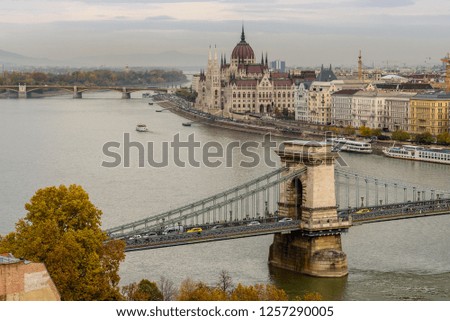 Panorama of the Hungarian Parliament, and the Chain bridge (Szechenyi Lanchid), over the River Danube, Budapest, Hungary Royalty-Free Stock Photo #1257290005