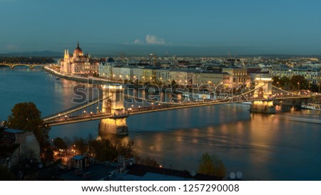 Panorama of the Hungarian Parliament, and the Chain bridge (Szechenyi Lanchid), over the River Danube, Budapest, Hungary, at night Royalty-Free Stock Photo #1257290008