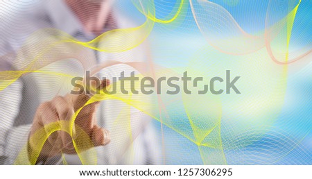 Man touching an abstract wave network concept on a touch screen with his finger