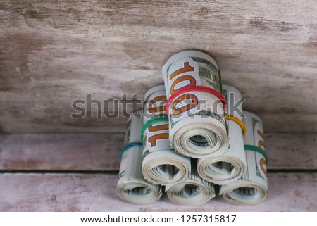 Close-up rolled American dollars banknotes