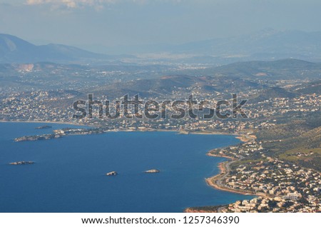 Aerial panoramic view of the Idyllic Eastern Attica near Athens, Greece. Amazing scenery against a deep blue sky over Eastern Attica. Aerial photography over Athens, Greece, Europe