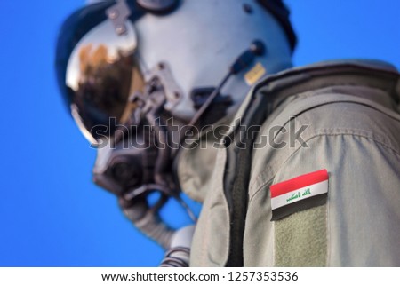 Air force pilot flight suit uniform with Iraq flag patch. Military jet aircraft pilot
