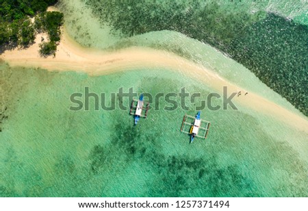 traditional boats at a Snake Island, archipelago Bacuit, Philippines Royalty-Free Stock Photo #1257371494