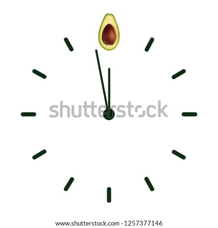 Half ripe green avocado with bone on the clock face with arrows as illustration time healthy lifestyle, emblem proper nutrition vegetarian diet bio brand quility restaurant. Copy space flatlay