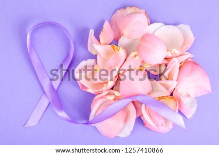 Lavender color ribbon, symbolizing awareness for all cancers, february 4th, world cancer day. Studio Photo
