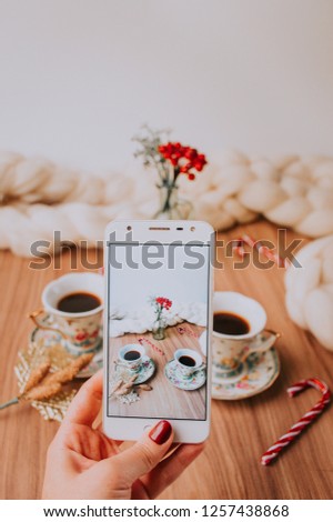 Takin" pic of Christmas table with coffee and tea