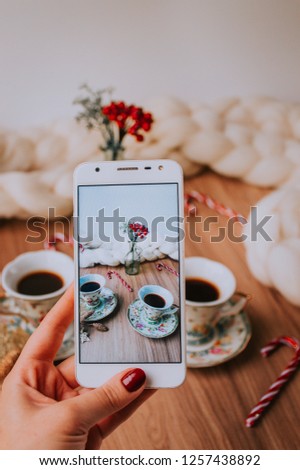 Takin" pic of Christmas table with coffee and tea