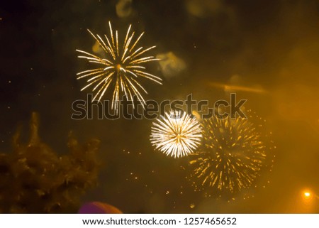 blue bright blurred fireworks effect abstract colorful background holiday celebration
 
