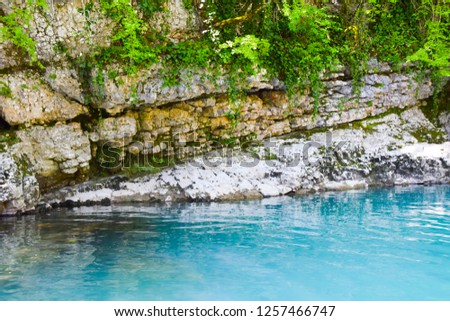 blue water bright river nature stones cliff gorge side view
 
