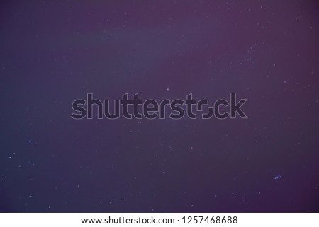 abstract bright background blue green purple northern lights and stars
 
