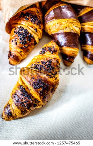 Crisp croissants with poppy seeds and chocolate