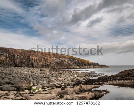 View Of Cullernose Point Near Howick, Northumberland Showing The Geology Of The Whin Sill Royalty-Free Stock Photo #1257478162