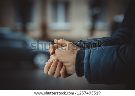 Hands in cold , winter , bad weather