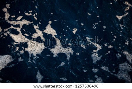 Aerial view of the sea surface. Close up of water