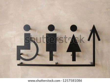 Toilet icon on concrete background