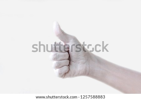 Female hands painted in white gesturing and expressing themselves with signs