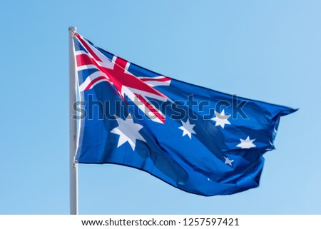 Australian Flag Flying Against  Clear Blue Sky