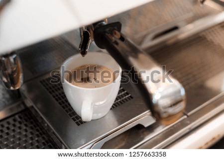 black coffee lover on coffee maker