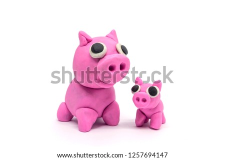 play dough Family Pig on white background. Handmade clay plasticine