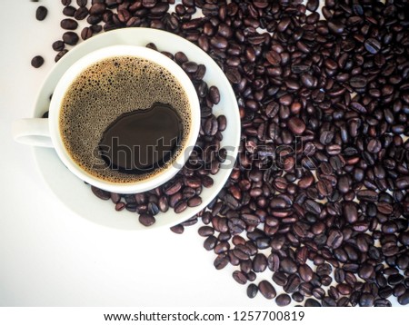 Coffee is in cups and coffee beans - images