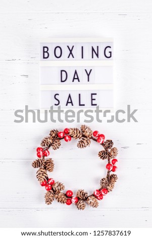 Creative Top view flat lay promotion composition Boxing day sale text on lightbox white background copy space Template Boxing day sale mockup winter christmas seasonal offer promotion advertising