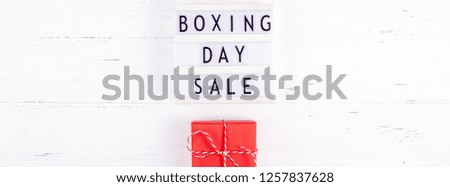 Creative Top view flat lay promotion composition Boxing day sale text on lightbox white background copy space Template Boxing day sale mockup winter christmas seasonal offer promotion advertising