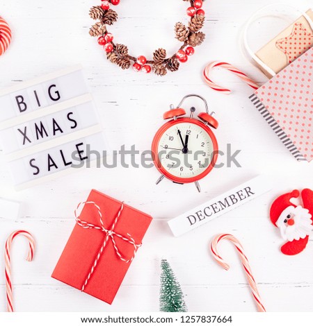 Creative Top view flat lay promotion composition Big Xmas sale text lightbox white wooden background copy space Template seasonal winter christmas offer promotion advertising scandinavian minimalism