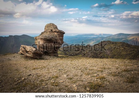 Stone mushrooms on northern slope of mountain Elbrus , 3200 meters above sea level. National park, Caucasus, Russia. Outdoor Leisure Concept