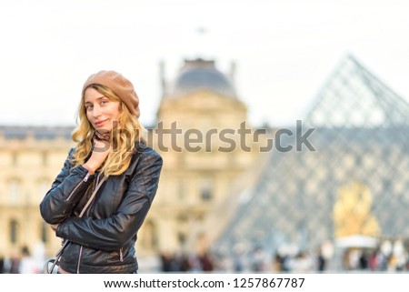 Woman in Paris, France. Young tourist girl admiring the views. French style. Portrait soft bokeh background