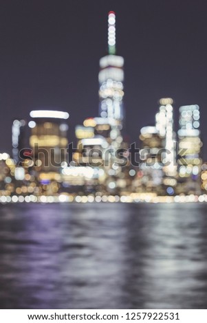 Blurred New York City skyline, abstract urban background, color toned picture, USA.