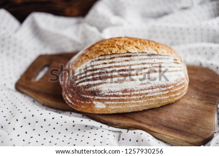 fresh homemade yeast-free bread on a wooden background