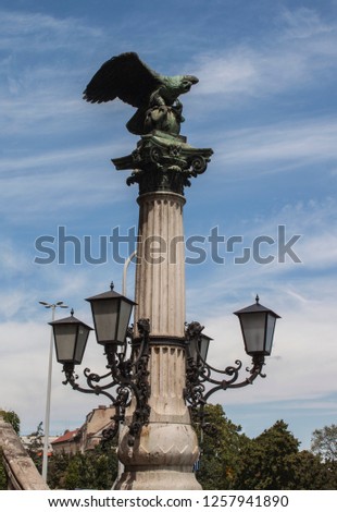 Statue of the mythological Turul bird in Budapest, Hungary, Europe. Sculpture of vulture with spread wings, legendary animal, symbol of the Arpad dynasty, the founders of the Hungarian state.