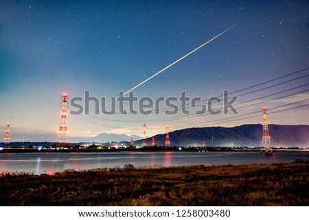 Meteor shower inside japan.meteor, meteorite, star, falling, neon, stars, explosion, shower, space, speed, background, flat, sky, vector, galaxy, shooting, design, astronomy, blue, beautiful, comet, a Royalty-Free Stock Photo #1258003480