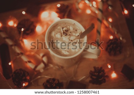 Christmas, New Year holiday background. Winter hot Christmas coffee or chocolate or cocoa with marshmallow with decorations.