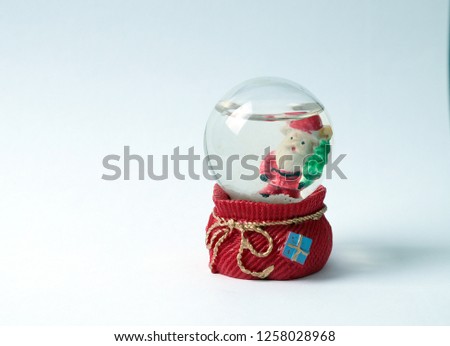 New Year snow globes on white background.
