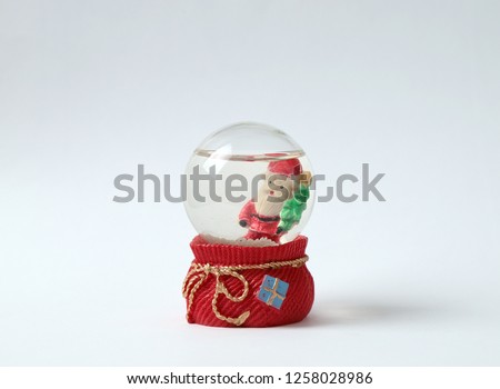 New Year snow globes on white background.