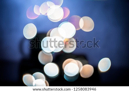 Colorful Christmas lights and blurred background or bookeh of them.;