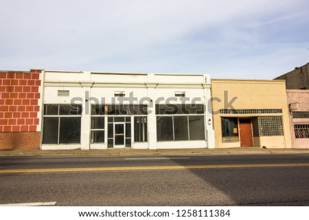 Abandoned Commercial Retail Store Fronts Royalty-Free Stock Photo #1258111384