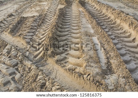 wheel tracks on the sand