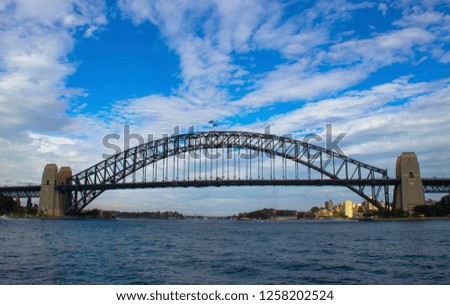Sydney harbour bridge. Morning commute in Sydney. View from ferry.