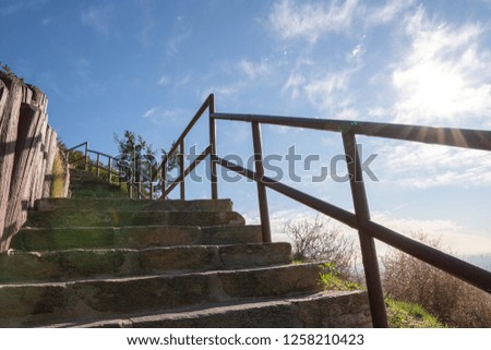 Stairs on observation deck on Hollywood Hills. Warm sunny day. Beautiful clouds in blue sky.