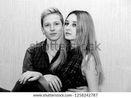 Portrait of a young couple, handsome guy and girl