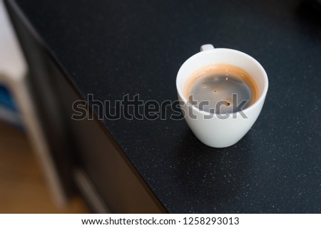 black coffee lover on coffee maker