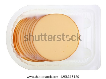  Round sheets slices of melted  smoked cheese in plastic container. Isolated with patch studio macro 