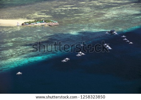 A view from the sky of Nalusuan Island in Cebu, Philippines. Royalty-Free Stock Photo #1258323850