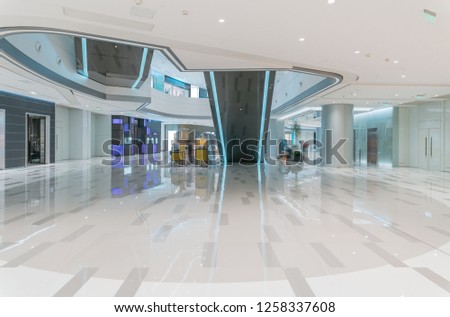 modern shopping mall interior  Royalty-Free Stock Photo #1258337608