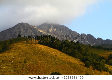 Photo of nature - nice petrous mountain slope with blue sky