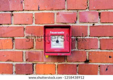 Fire alarm on the house wall 
