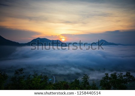 twilight cloudscape, mountain range and fog at northern Thailand
